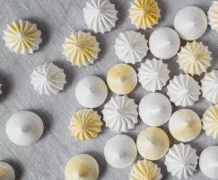Shimmering Meringue Kisses on a grey background