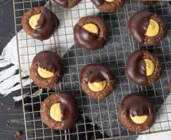 Nanaimo Thumbprint Cookies on a wire cooling rack