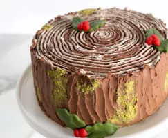 yule log stump cake on a cake plate